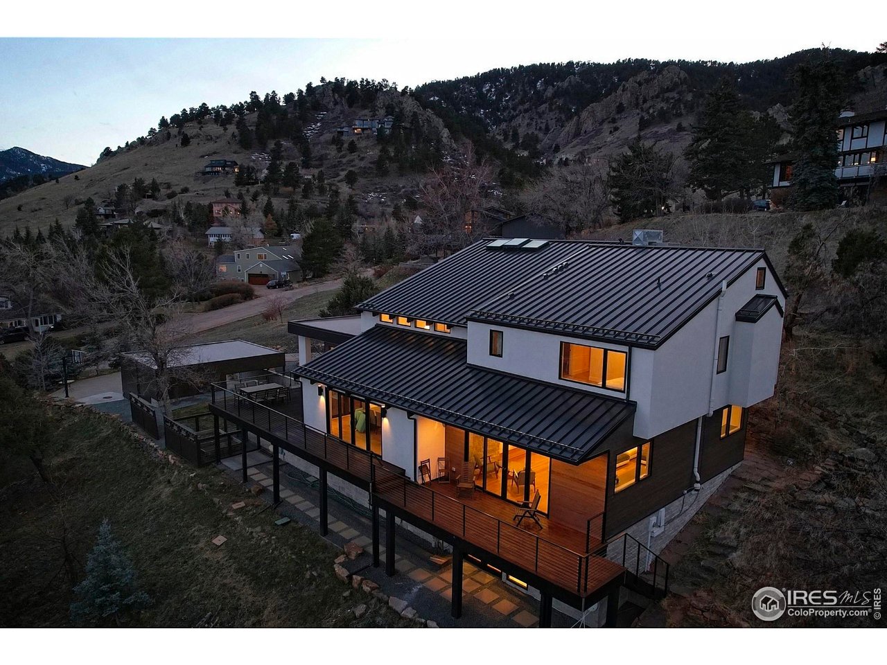 210 Cactus Court Boulder, CO 80304 - Photo 40 of 50 a view of a roof deck with wooden floor and mountain view