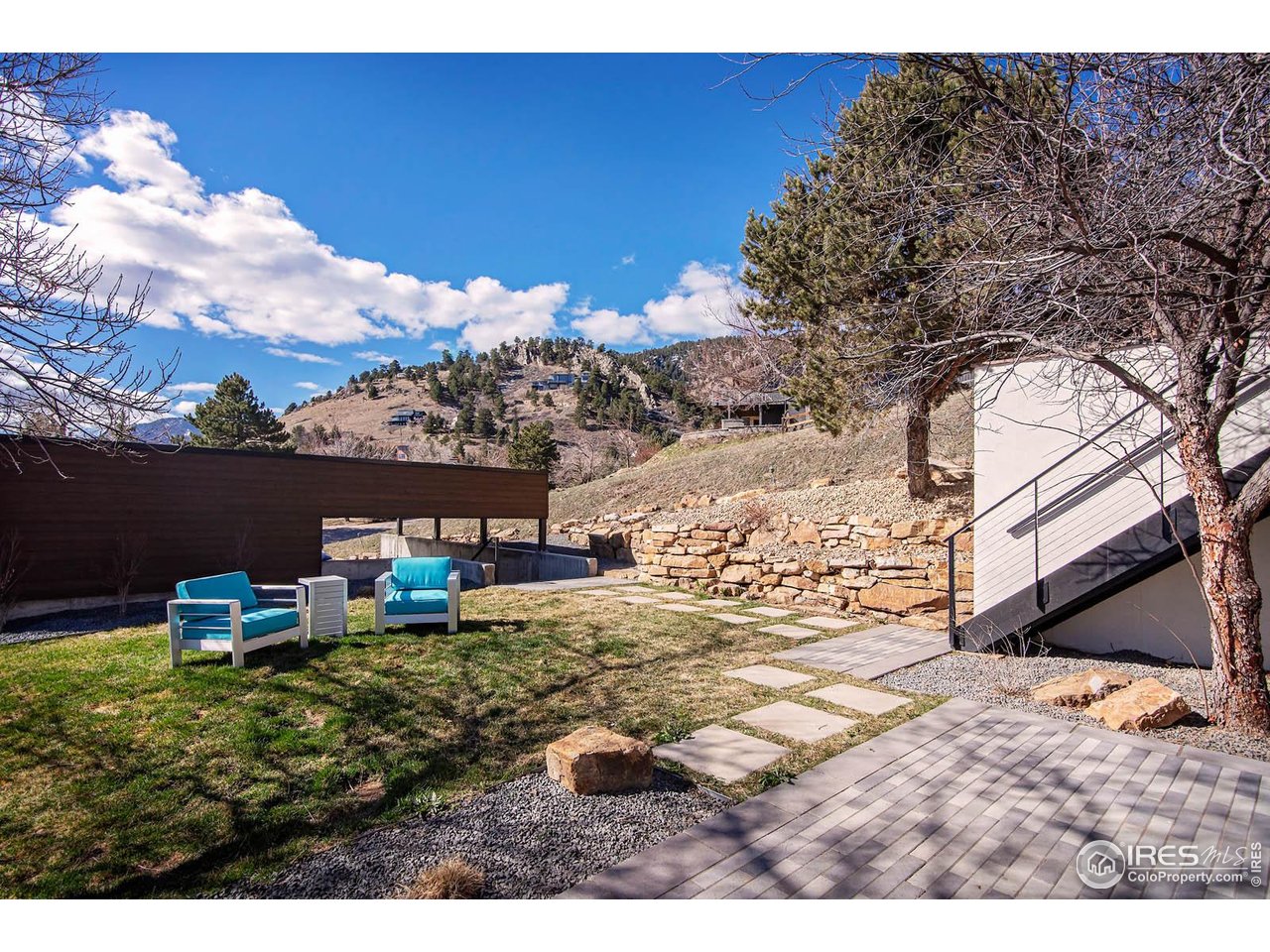 210 Cactus Court Boulder, CO 80304 - Photo 44 of 50 Level lawn can accommodate a pool or spa pool. Access to detached garage, carport, cement play area with basketball hoop