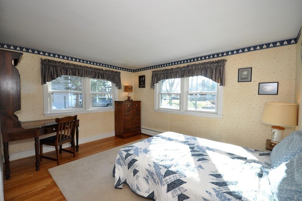 17 Cox Road Winchester, MA 01890 - Photo 10 of 19 a bedroom with a bed and a window