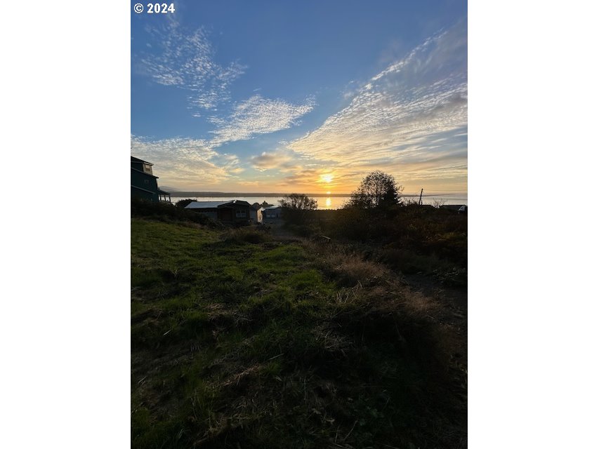 Grant Street Rockaway Beach, OR 97136 - Photo 4 of 10 a view of a yard
