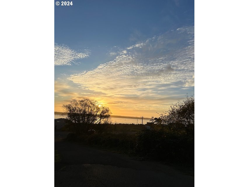 Grant Street Rockaway Beach, OR 97136 - Photo 9 of 10 a view of ocean from a window