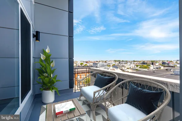 a bathroom with a shower curtain and a toilet