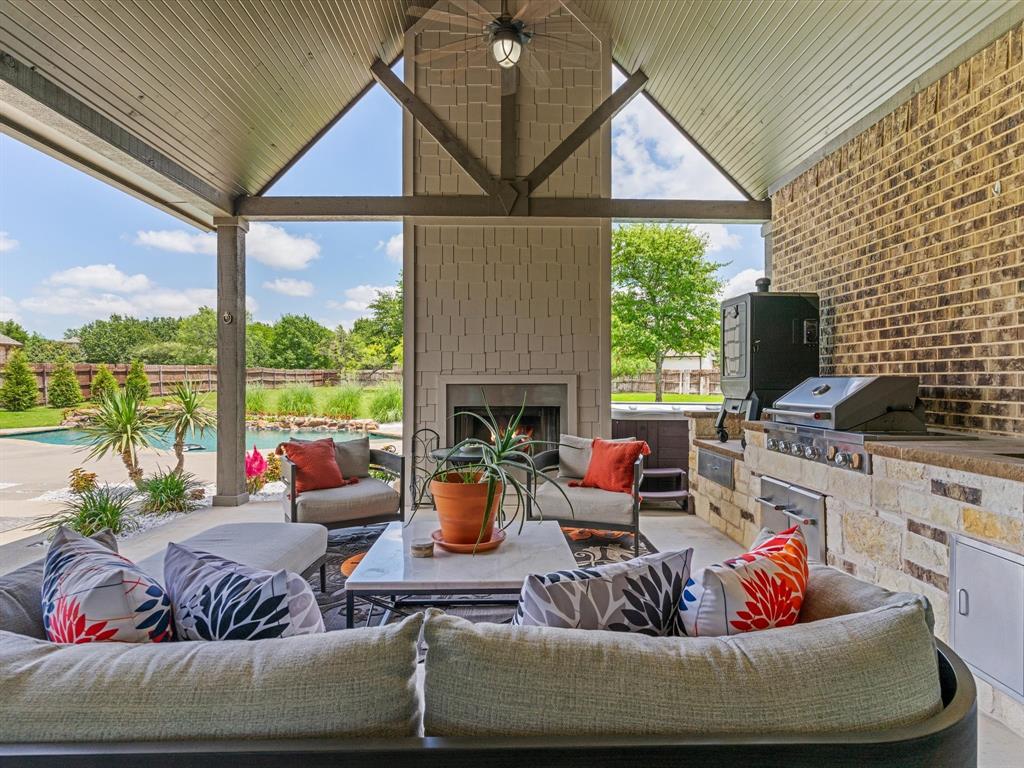 111 Old Base Road Aurora, TX 76078 - Photo 2 of 38 Covered outdoor living area overlooking the pool and backyard oasis.