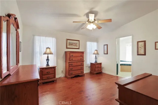 a view of a livingroom with furniture and a window