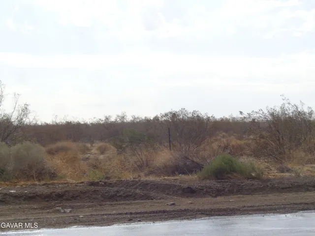 a view of mountain view with mountains in the background
