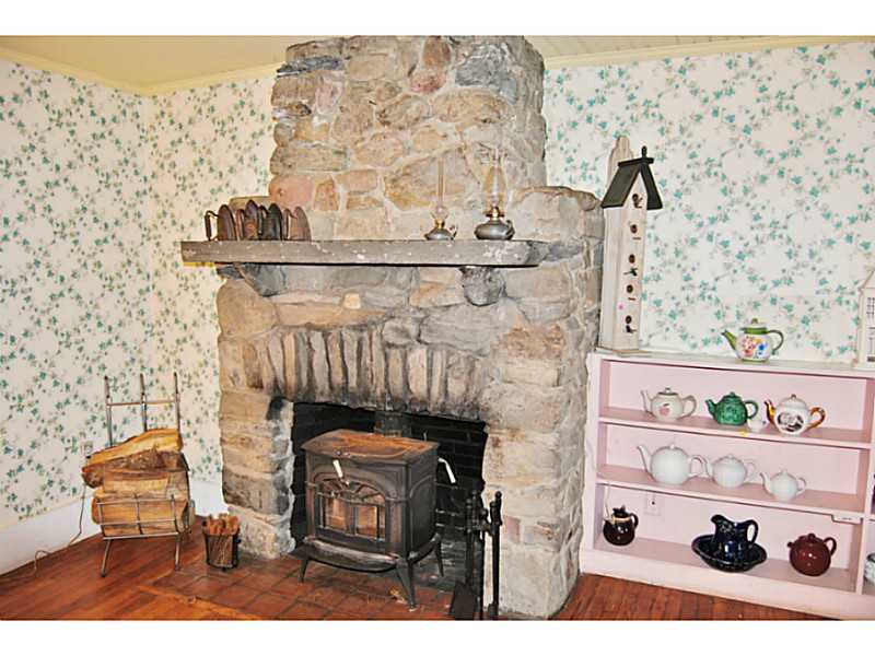 6 Sunset Road Bristol, RI 02809 - Photo 5 of 22 Living Room. Fieldstone fireplace