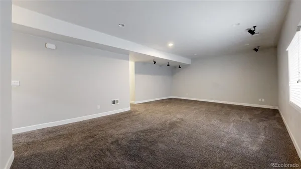 an empty room with a natural light
