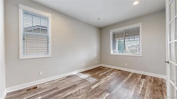 a view of a room that has a window in it