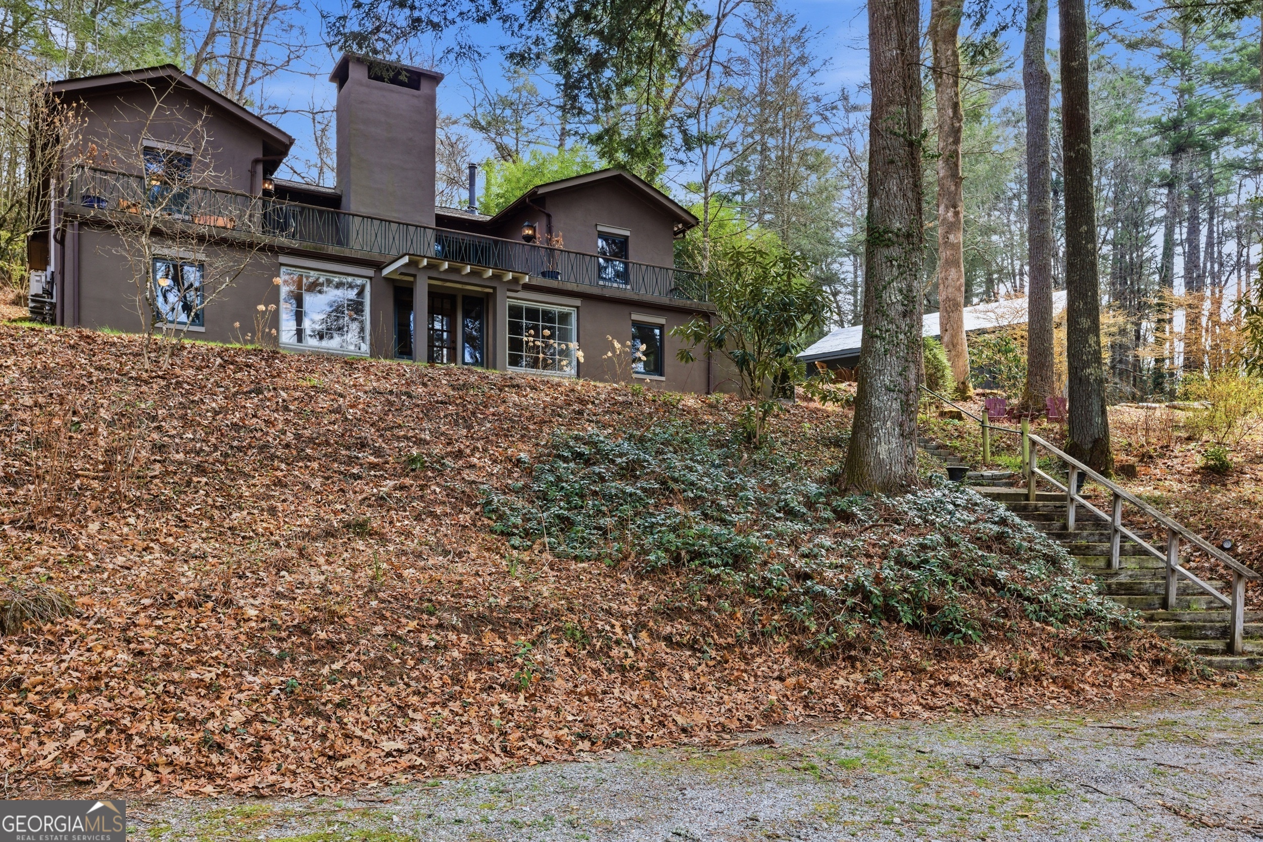 1921 Franklin Road Highlands, NC 28741 - Photo 62 of 72 a front view of a house with a yard