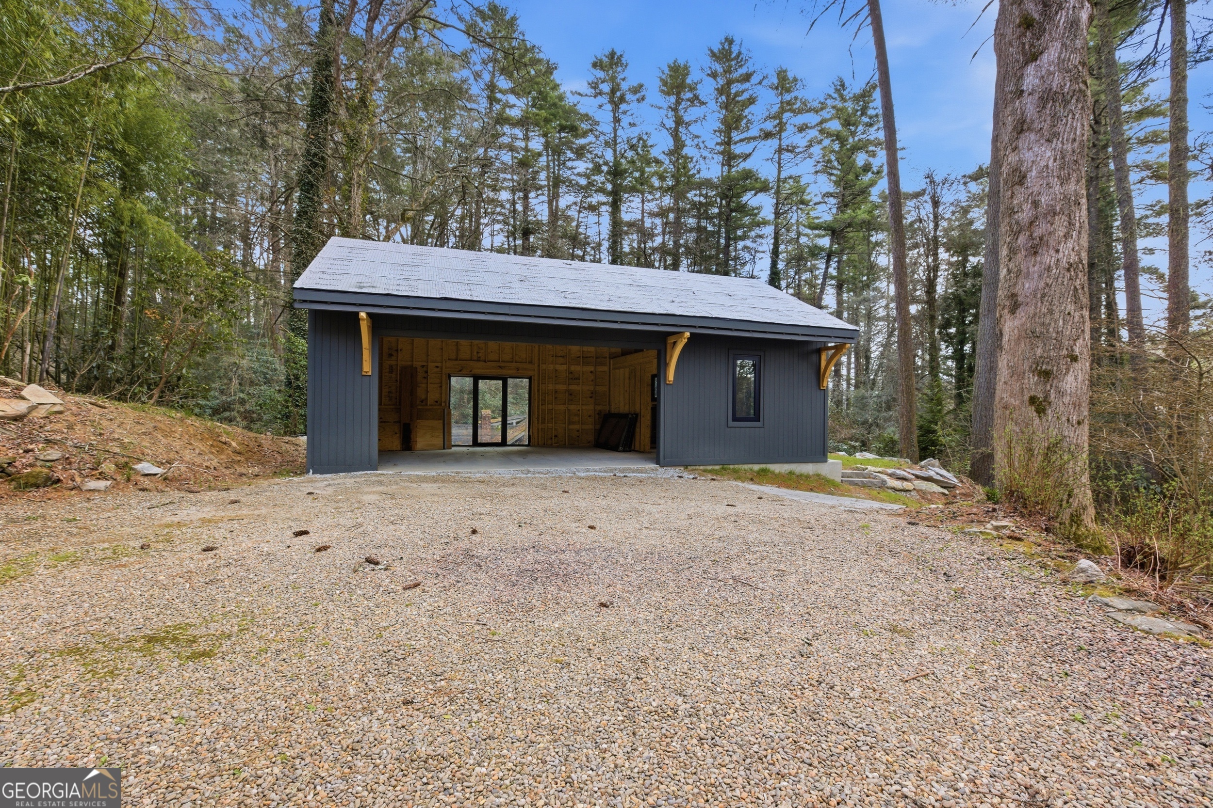 1921 Franklin Road Highlands, NC 28741 - Photo 69 of 72 a house with trees in the background