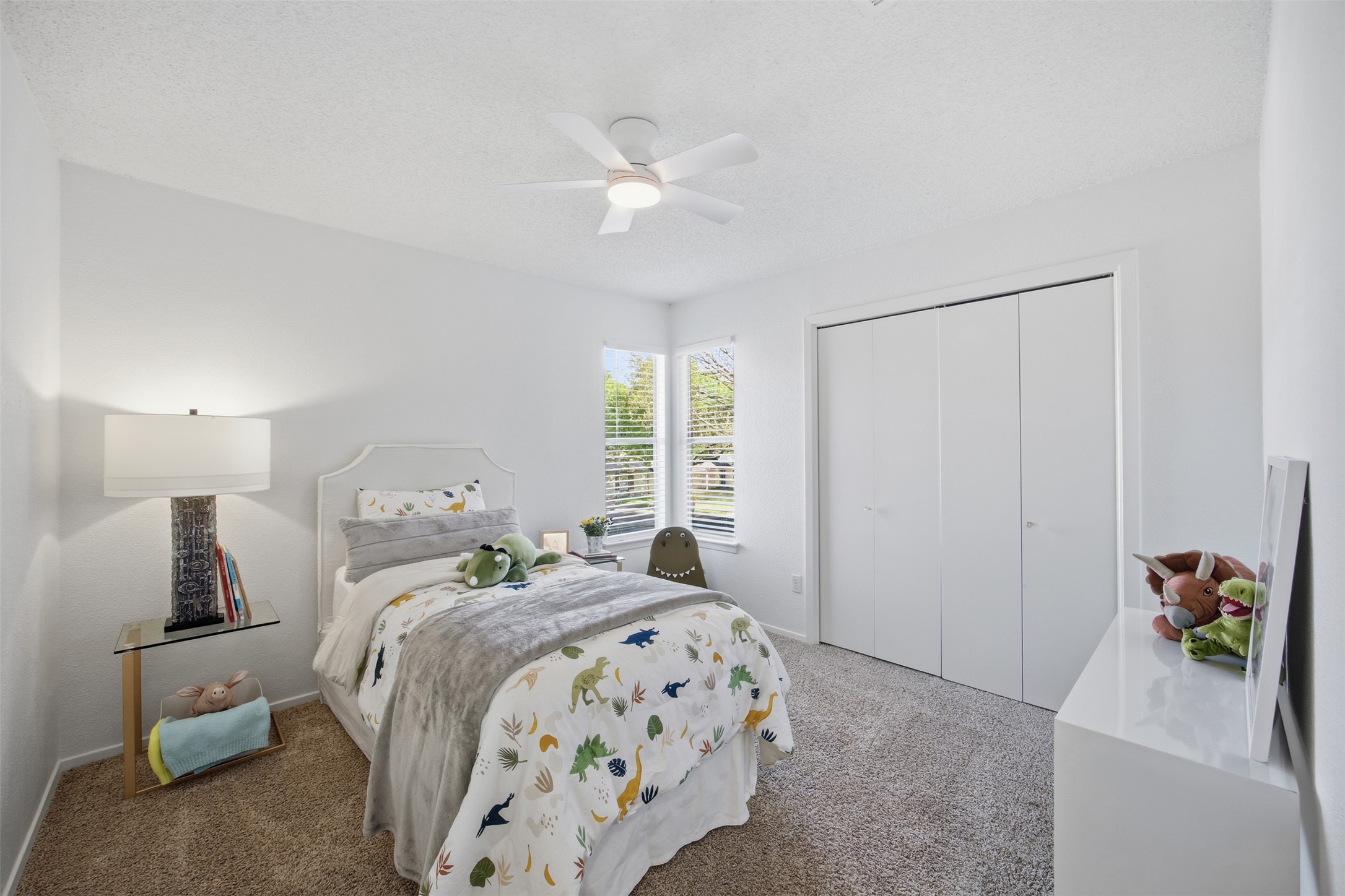 3200 Spaniel Drive Austin, TX 78759 - Photo 20 of 24 a bedroom with a bed and a window