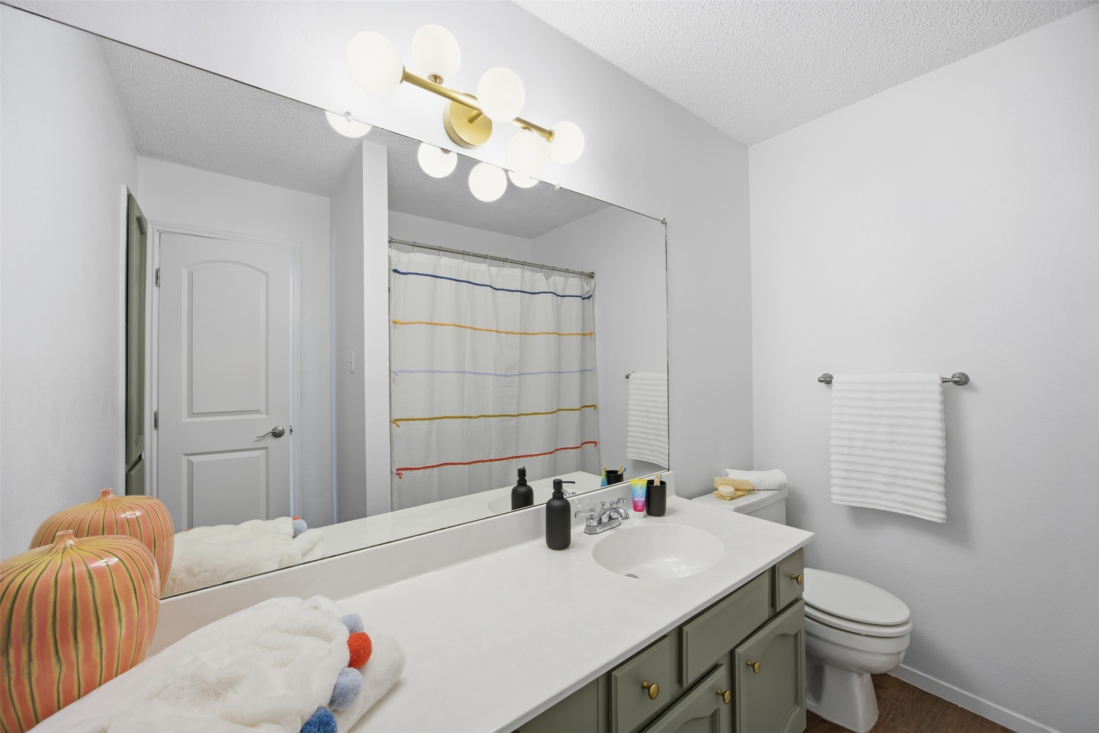 3200 Spaniel Drive Austin, TX 78759 - Photo 22 of 24 a bathroom with a sink vanity granite and toilet