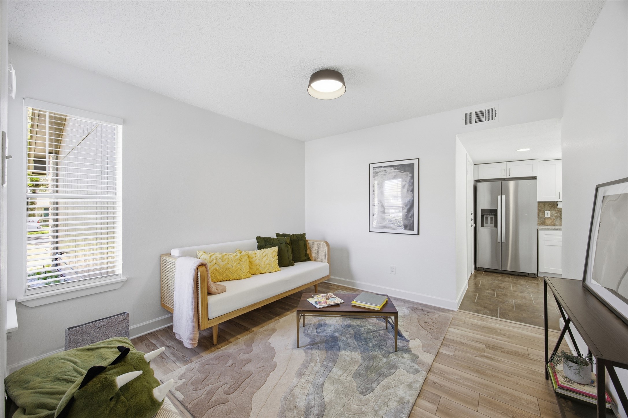 3200 Spaniel Drive Austin, TX 78759 - Photo 8 of 24 a living room with furniture and a window