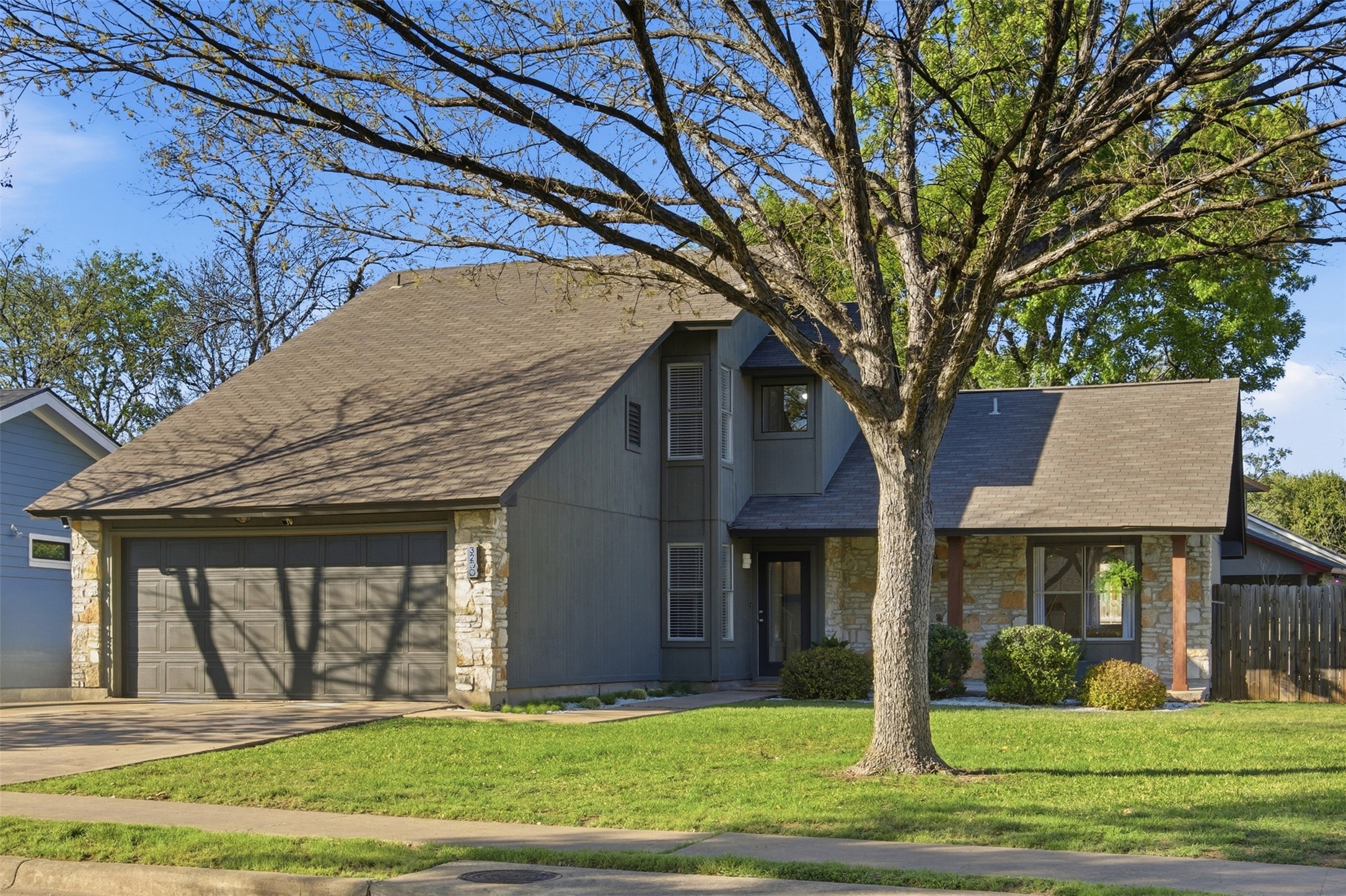 3200 Spaniel Drive Austin, TX 78759 - Photo 9 of 24 a front view of a house with a yard