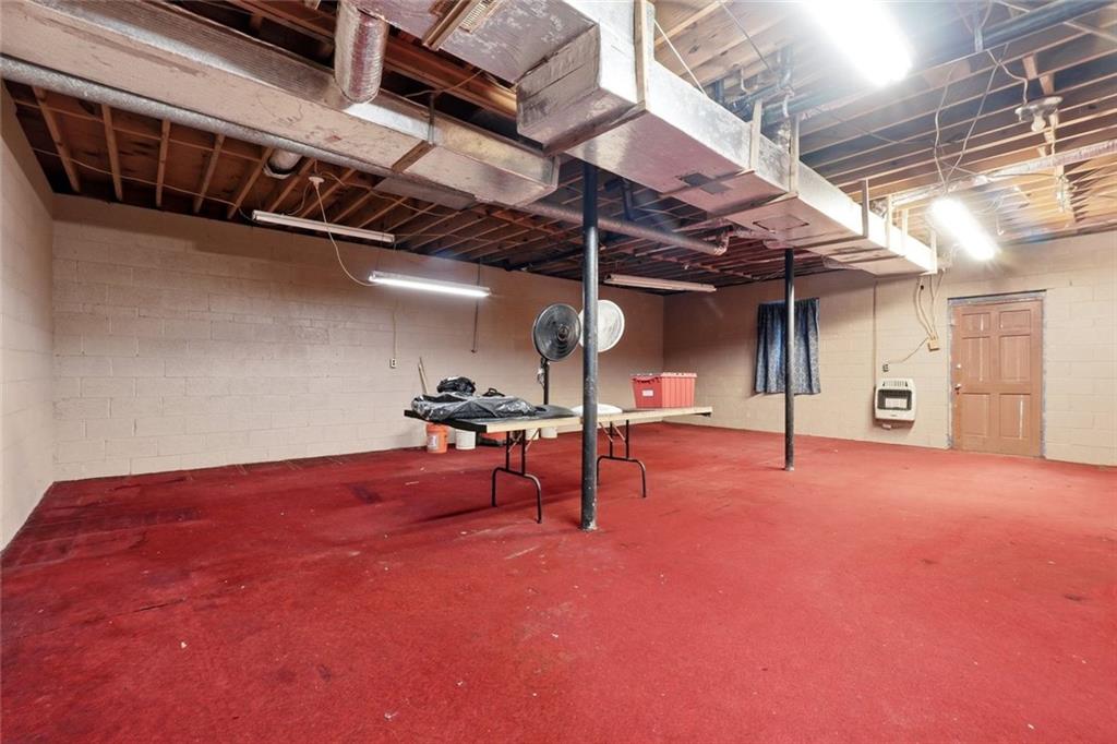 399 Donahoo Road Southeast Silver Creek, GA 30173 - Photo 14 of 22 a view of a room with gym equipment