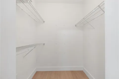 a view of small space with racks on the wall