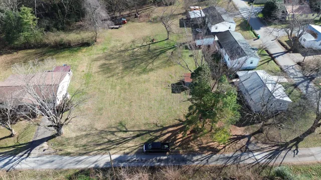 a aerial view of residential house with outdoor space