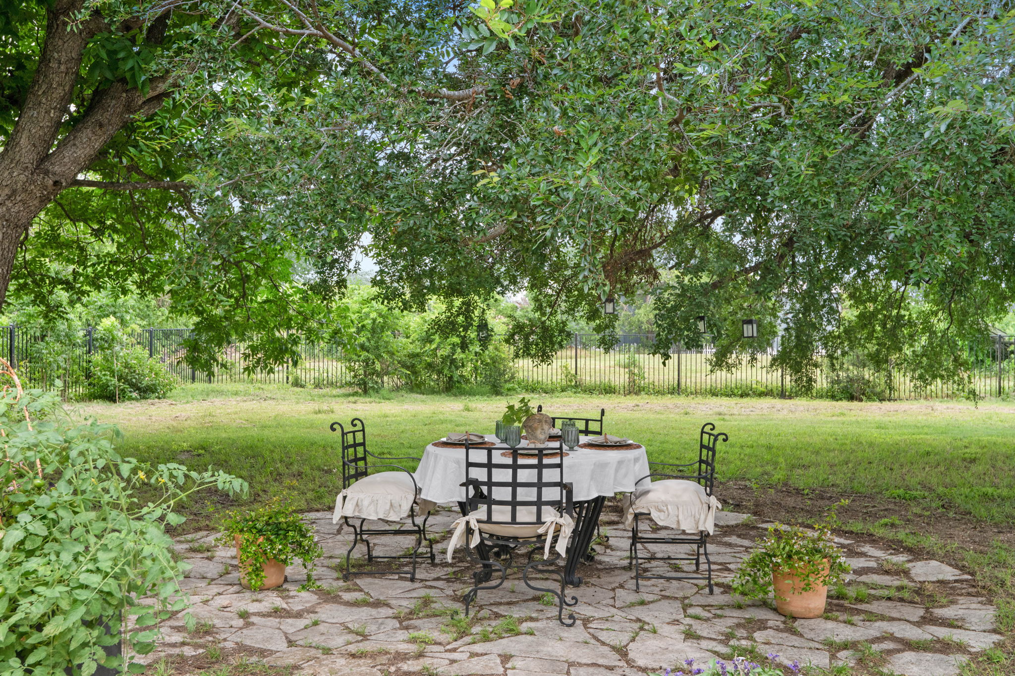 17919 Manda Carlson Road Coupland, TX 78615 - Photo 33 of 40 a view of a chair and table on the garden