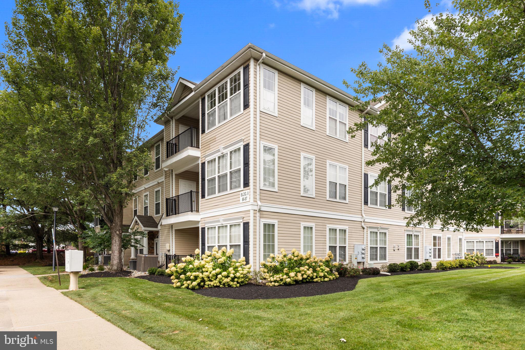 97 Kyle Way Ewing, NJ 08628 - Photo 1 of 33 a front view of building with yard