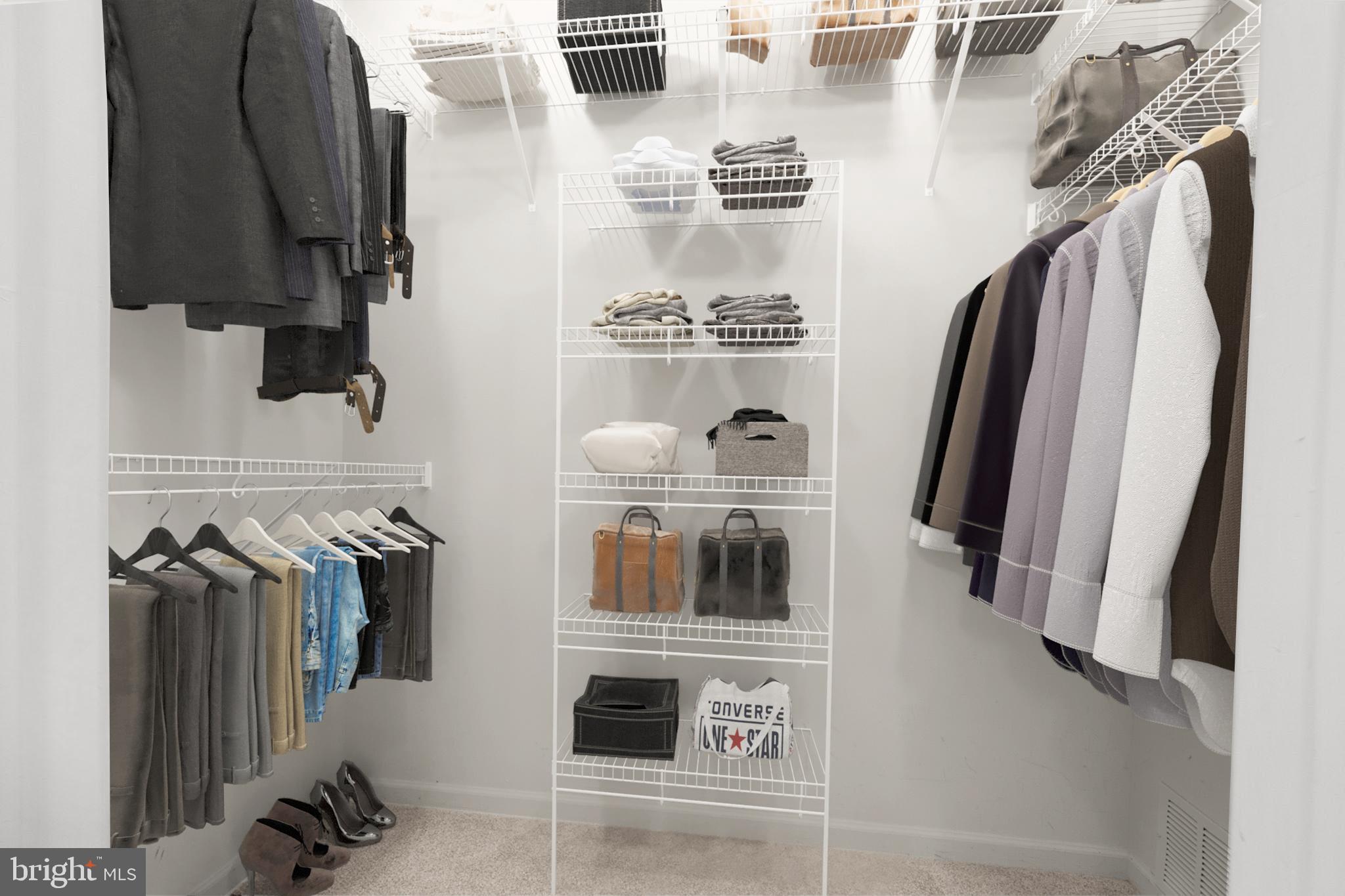 97 Kyle Way Ewing, NJ 08628 - Photo 16 of 33 a view of walk in closet with clothes and shoes