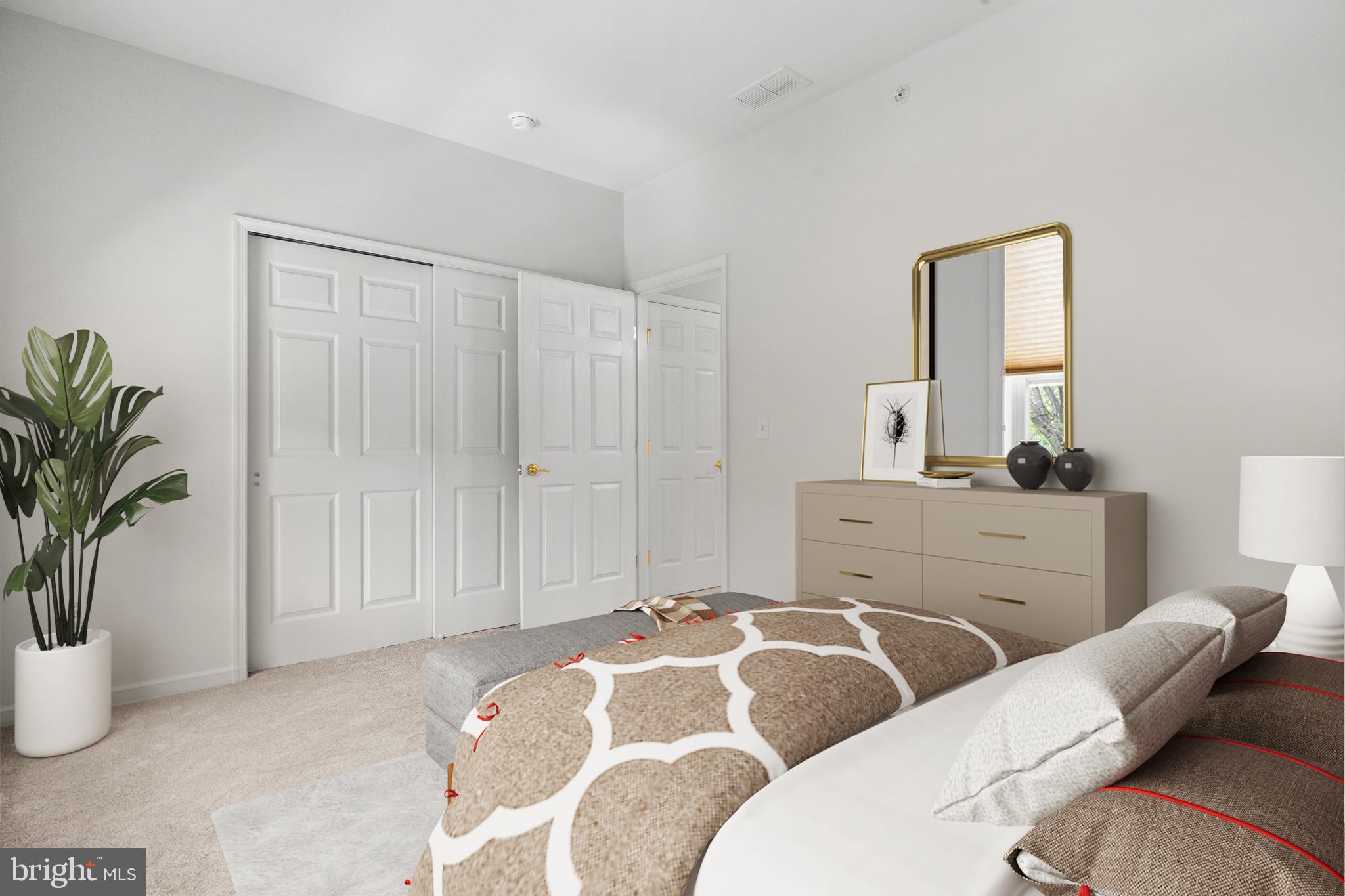 97 Kyle Way Ewing, NJ 08628 - Photo 20 of 33 a bedroom with a bed and a potted plant
