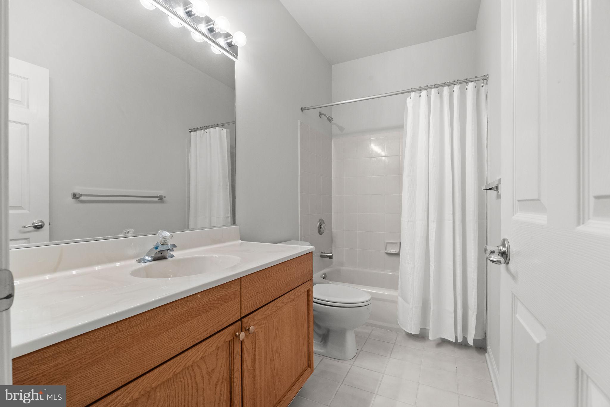 97 Kyle Way Ewing, NJ 08628 - Photo 21 of 33 a bathroom with a sink toilet and shower