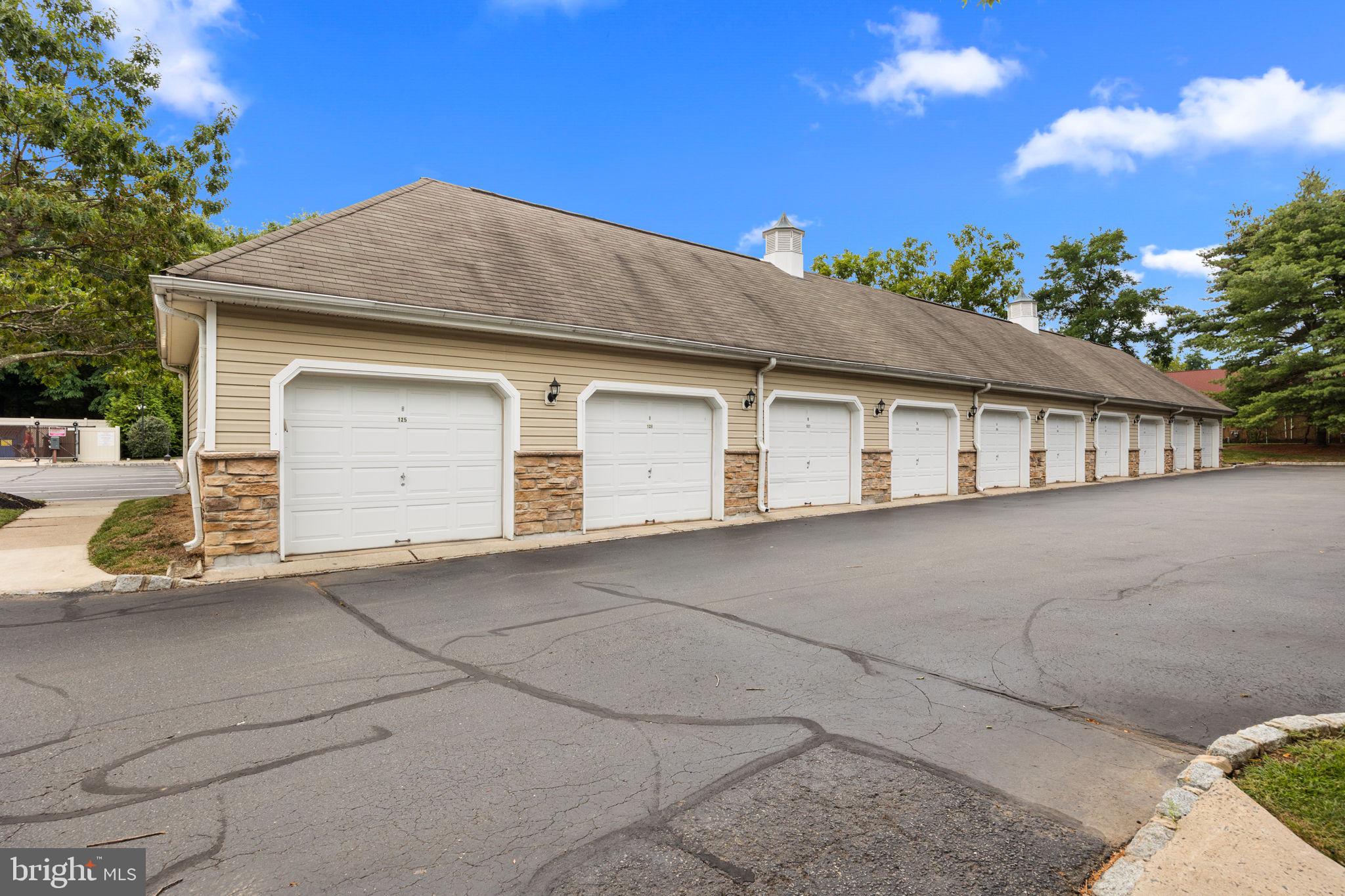 97 Kyle Way Ewing, NJ 08628 - Photo 27 of 33 a front view of a house with a garage