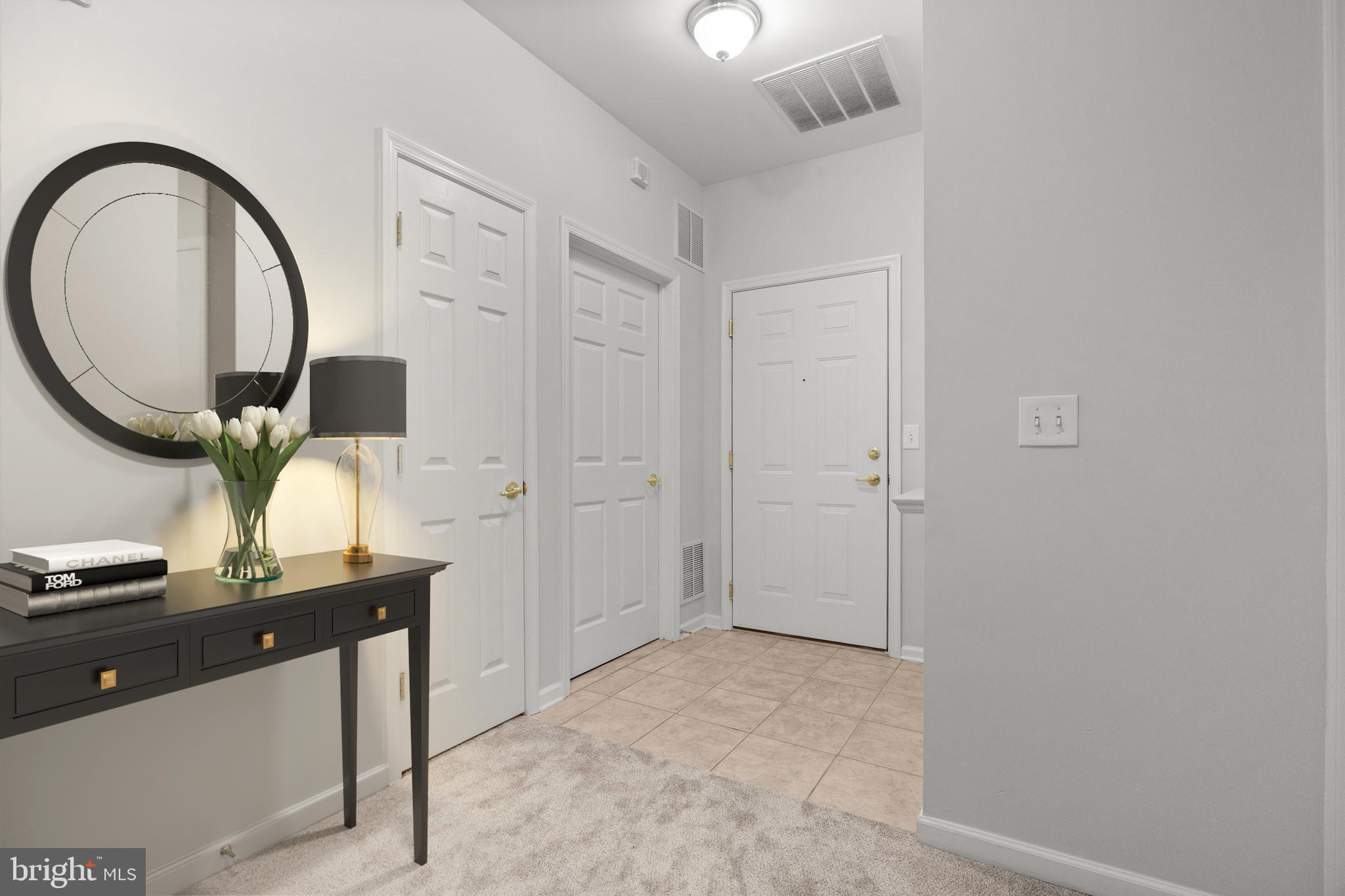 97 Kyle Way Ewing, NJ 08628 - Photo 5 of 33 a view of a livingroom with furniture and mirror