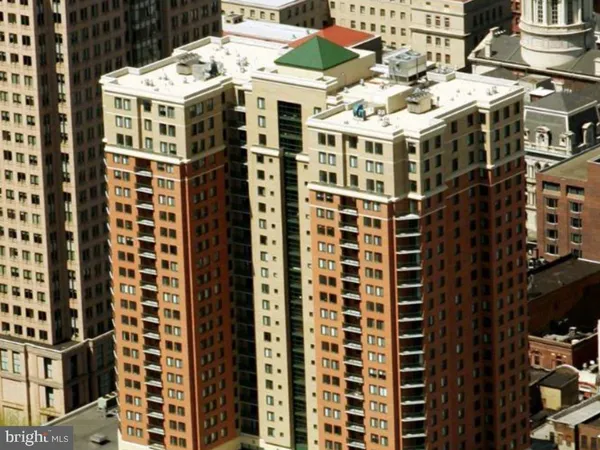 a front view of a building with glass windows