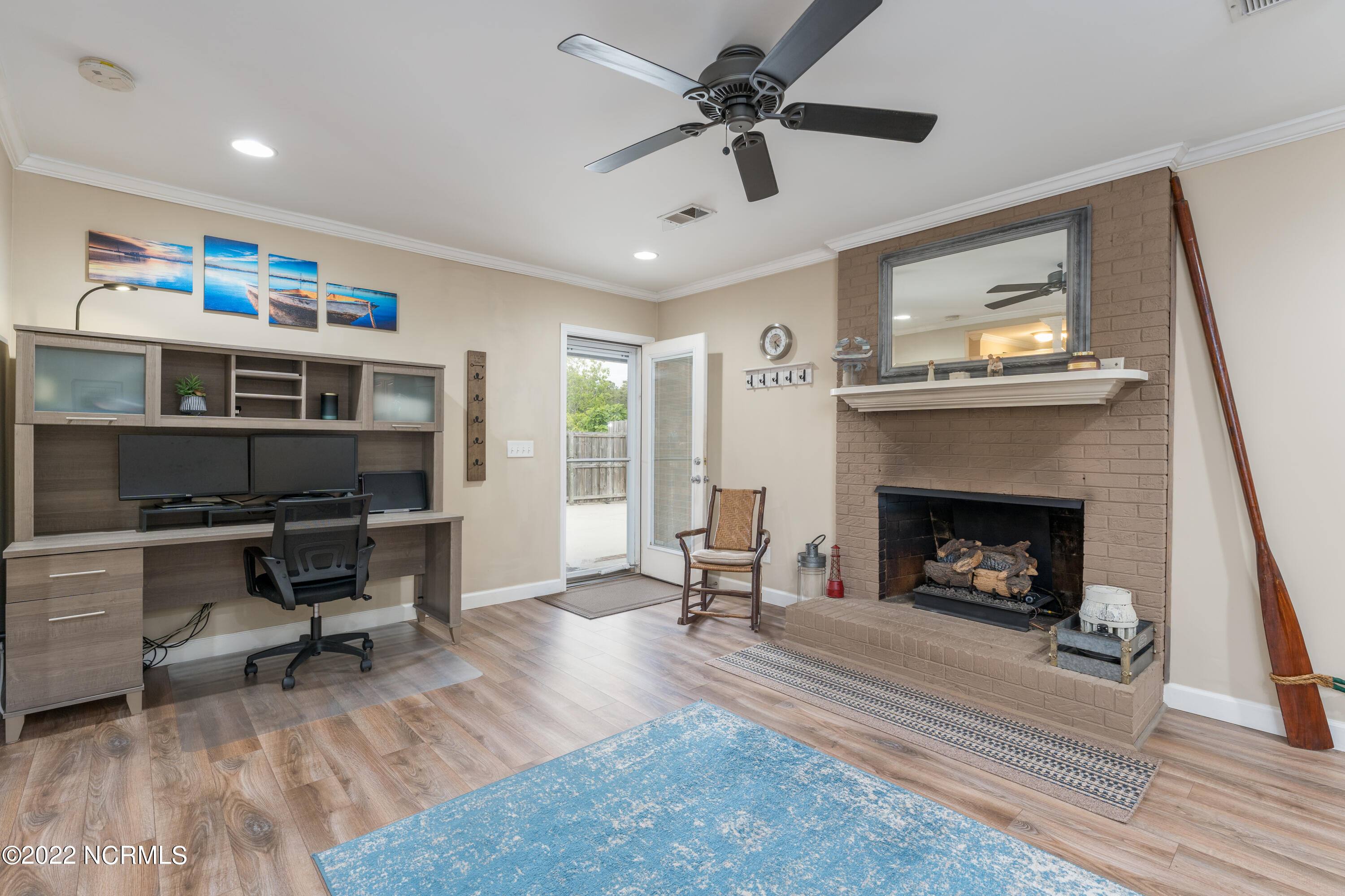 5301 Peden Point Road Wilmington, NC 28409 - Photo 10 of 40 Family Room exit to Pool area