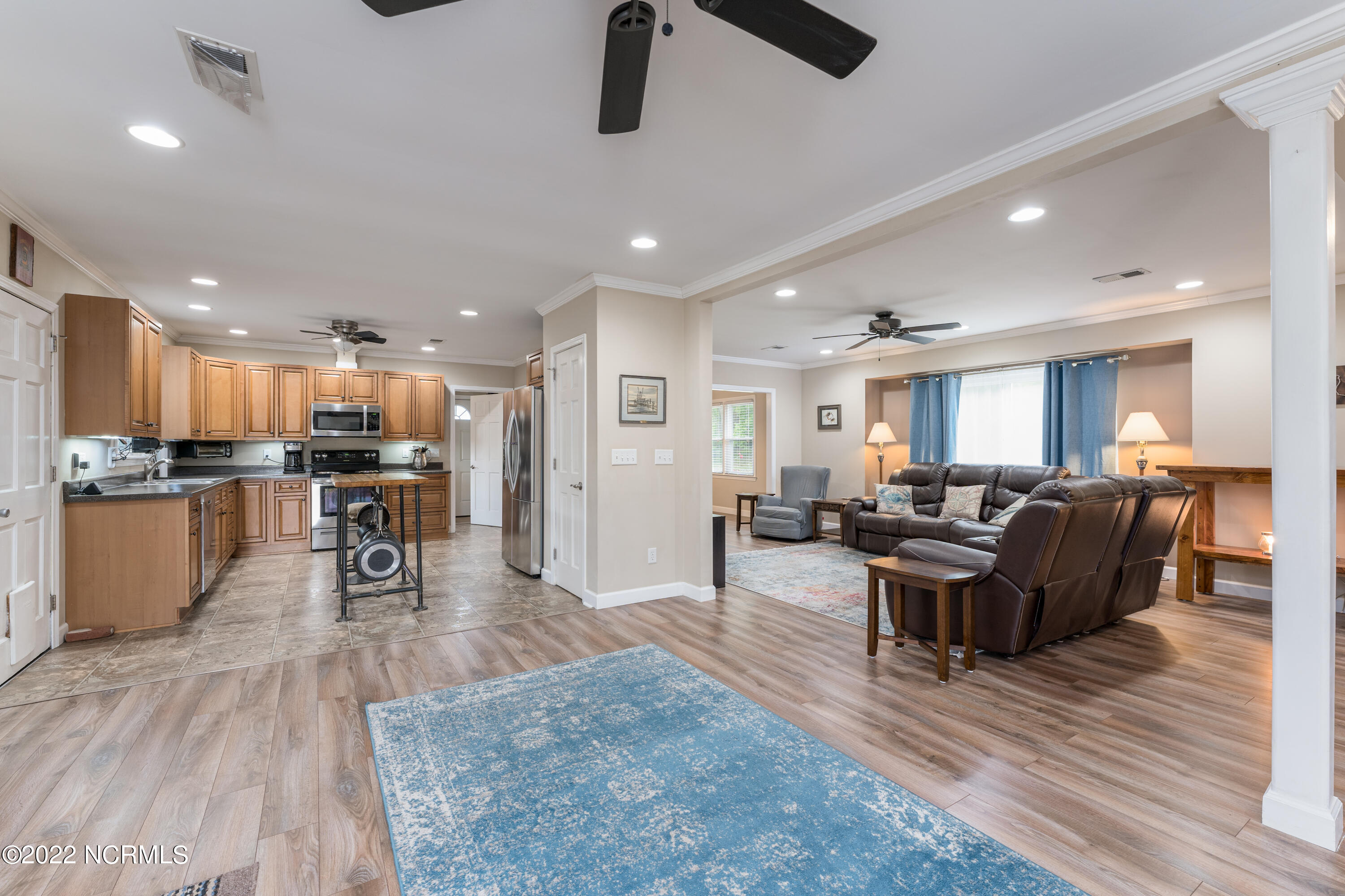5301 Peden Point Road Wilmington, NC 28409 - Photo 11 of 40 Family room looking toward Living, Kitchen and Dining rooms
