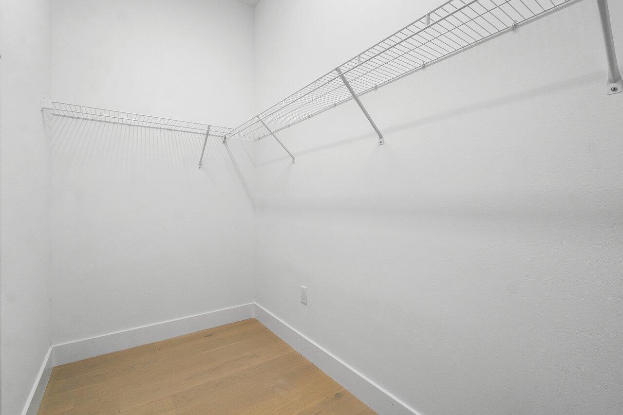 17291 Rainstream Road Boca Raton, FL 33496 - Photo 11 of 21 a view of a room with racks on the wall