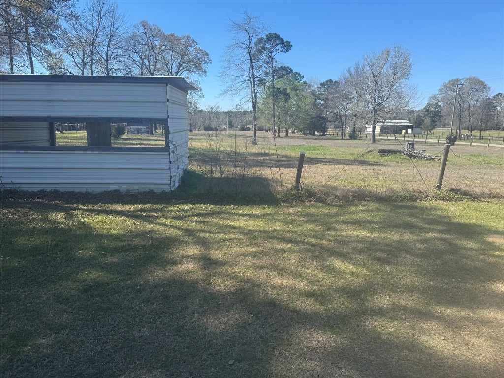 15698 Plaster Circle Conroe, TX 77303 - Photo 3 of 14 a view of a backyard