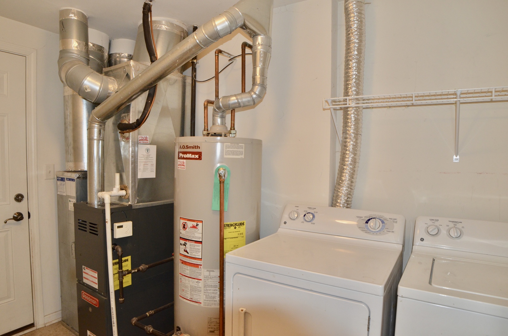 423 Azalea Street Elgin, IL 60124 - Photo 20 of 21 a utility room with dryer and washer