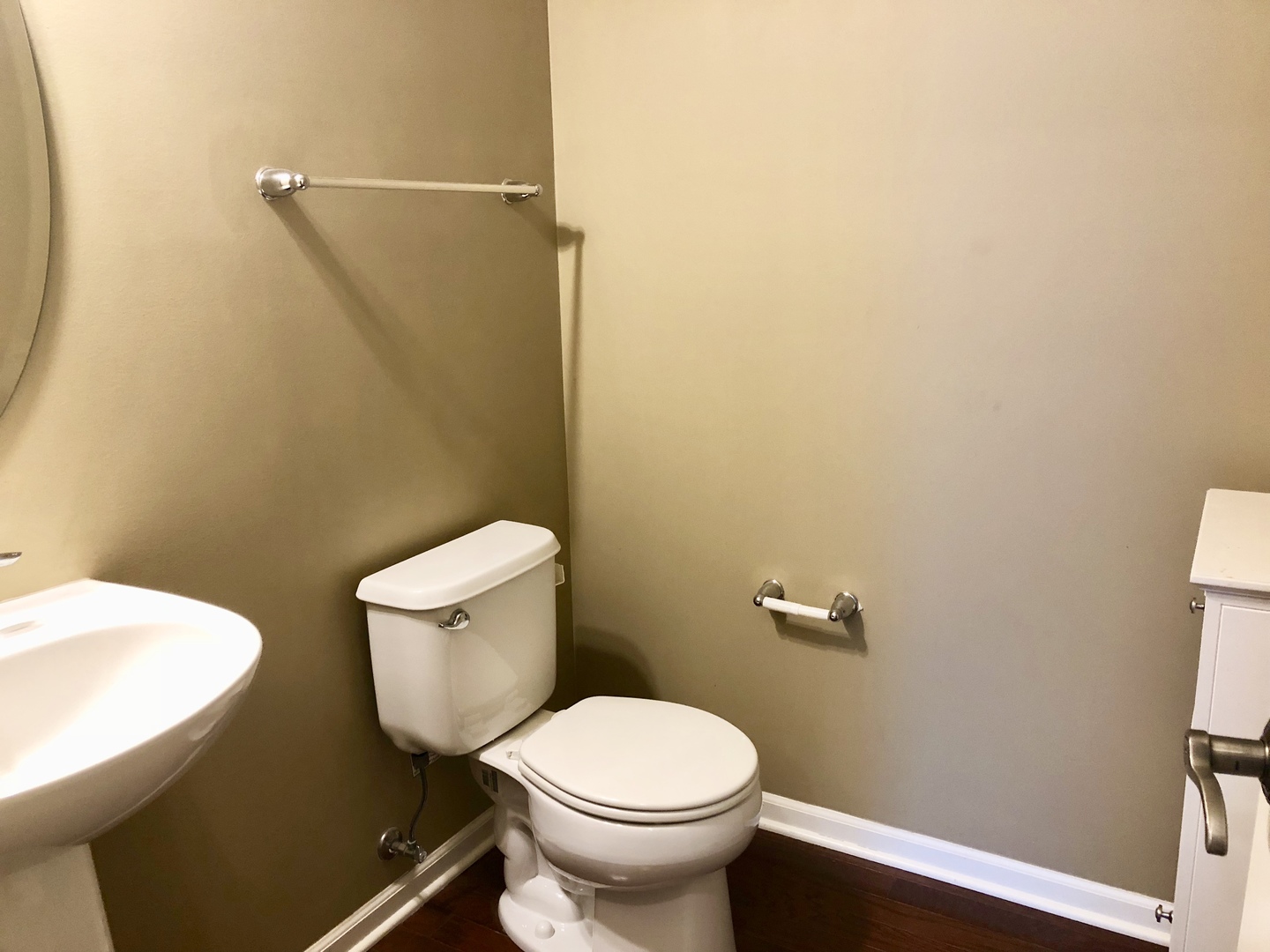 423 Azalea Street Elgin, IL 60124 - Photo 7 of 21 a white toilet sitting next to a white wall