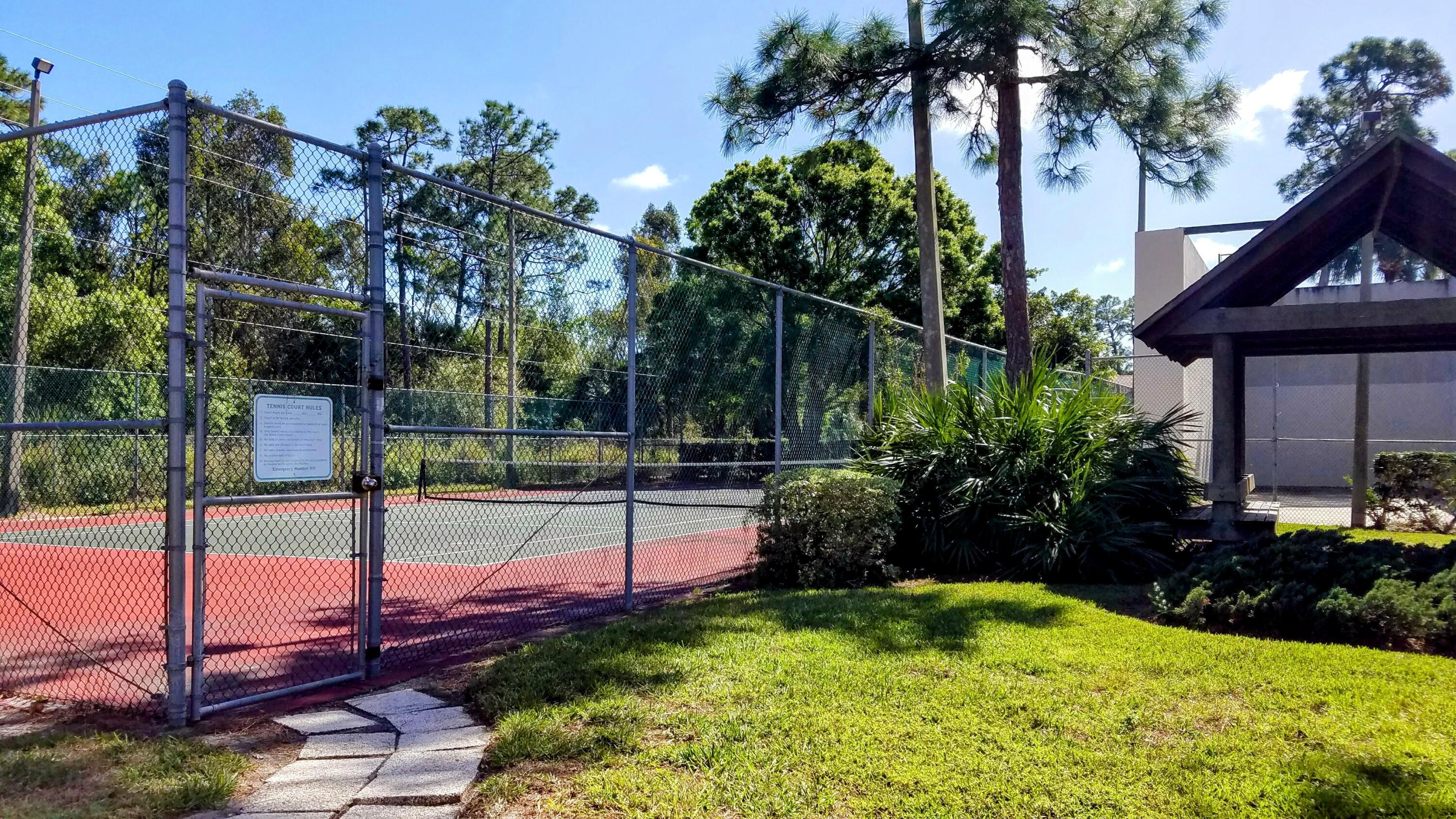 2821 Stoneway Lane, Unit A Fort Pierce, FL 34982 - Photo 13 of 14 a view of a backyard with plants