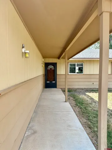 a porch with seating space