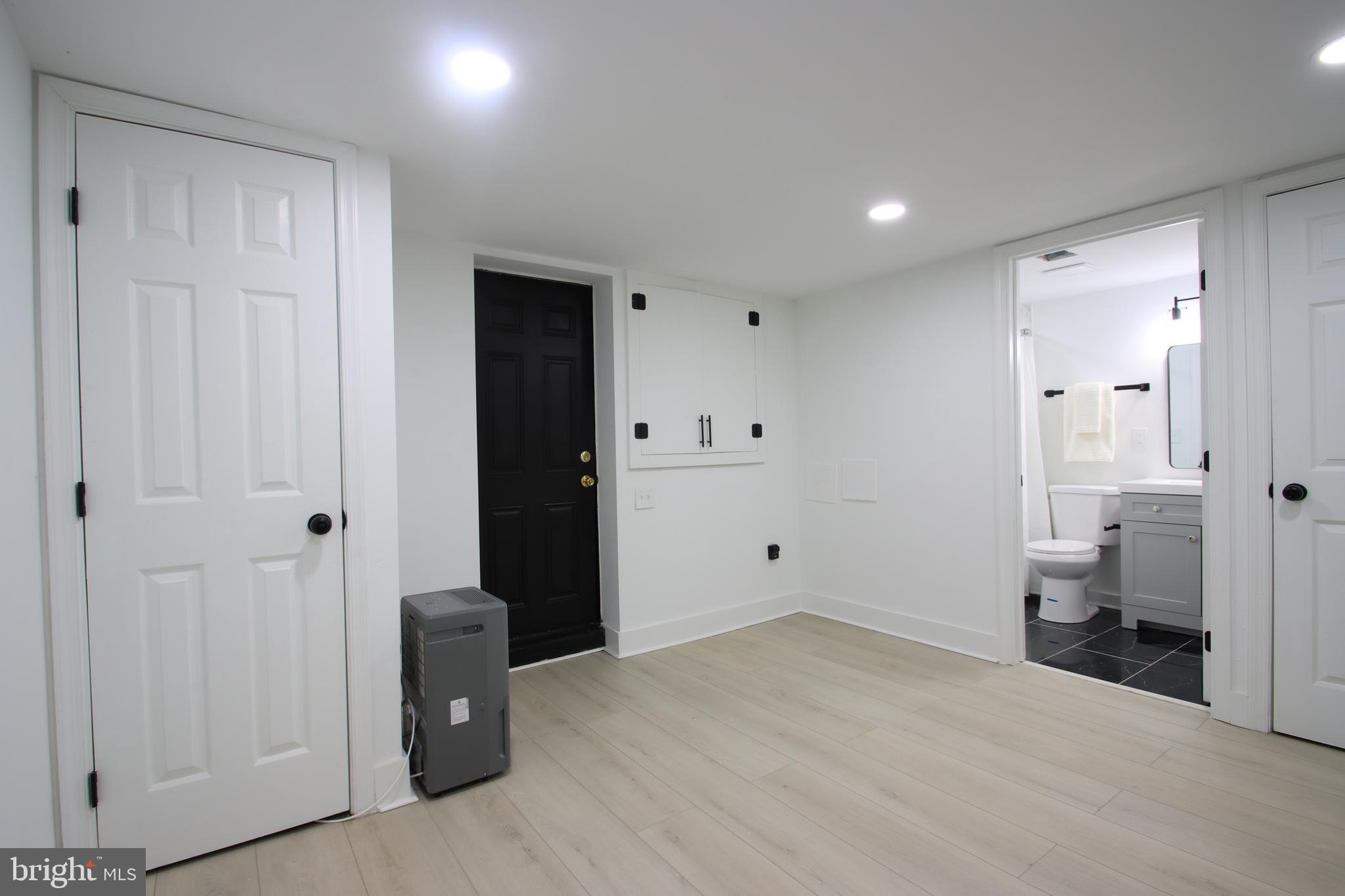 4501 Rokeby Road Baltimore, MD 21229 - Photo 22 of 26 a bathroom with a sink and a toilet