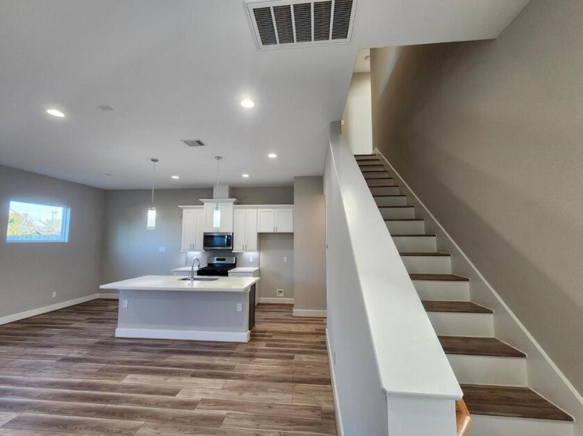 3206 Bostic Street Houston, TX 77093 - Photo 12 of 28 a view of kitchen and hall with wooden floor
