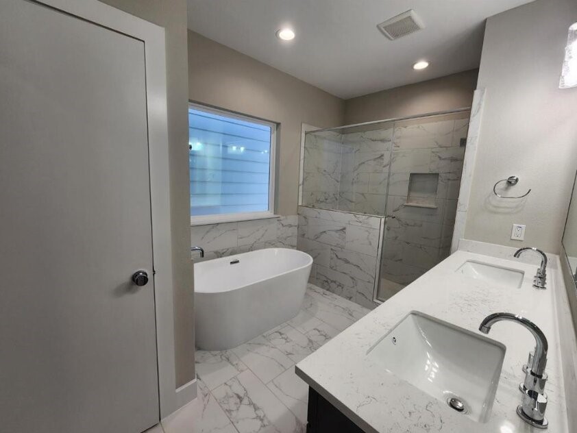 3206 Bostic Street Houston, TX 77093 - Photo 24 of 28 a bathroom with a sink a toilet and shower