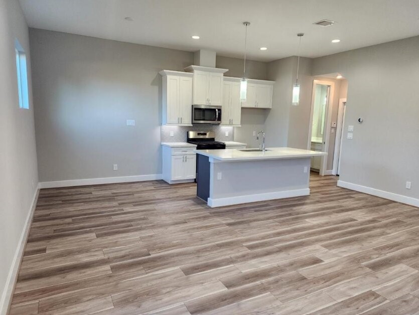 3206 Bostic Street Houston, TX 77093 - Photo 8 of 28 a view of kitchen with stainless steel appliances granite countertop a stove and a sink