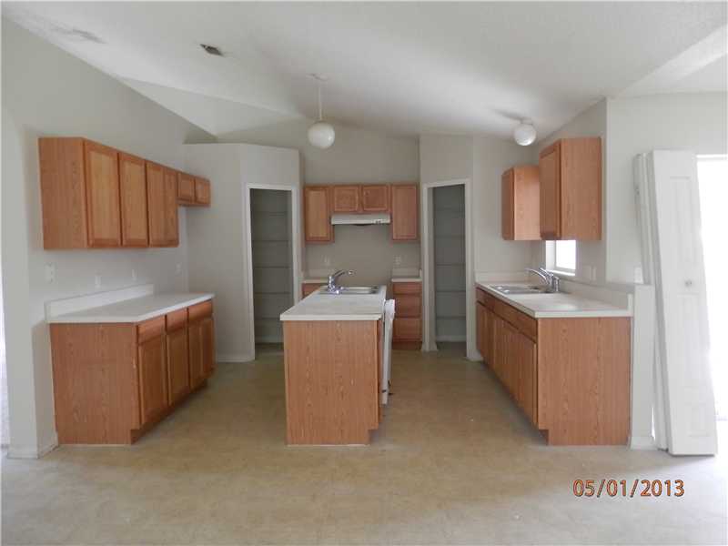 801 Roseland Road Sebastian, FL 32958 - Photo 2 of 11 a utility room with sink dryer and washer
