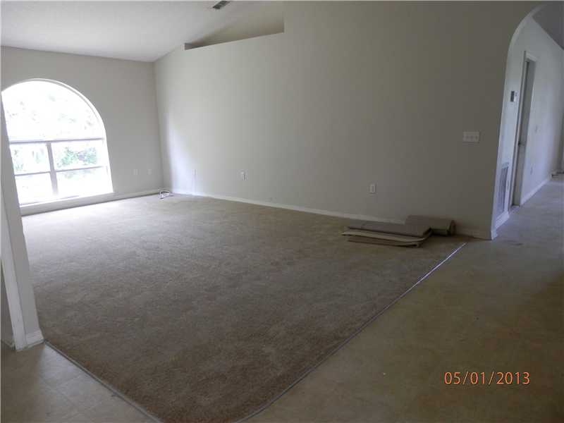 801 Roseland Road Sebastian, FL 32958 - Photo 3 of 11 an empty room with a window