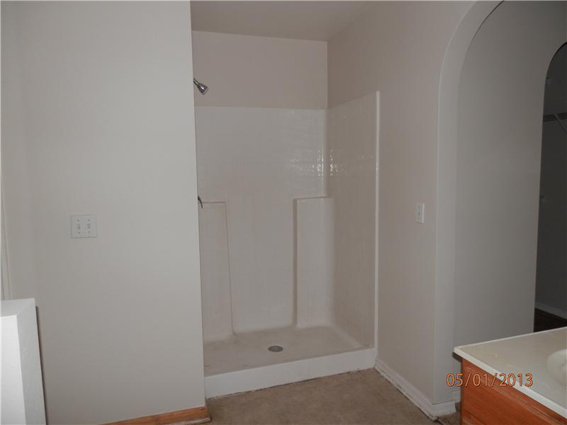 801 Roseland Road Sebastian, FL 32958 - Photo 9 of 11 a bathroom with a granite countertop shower