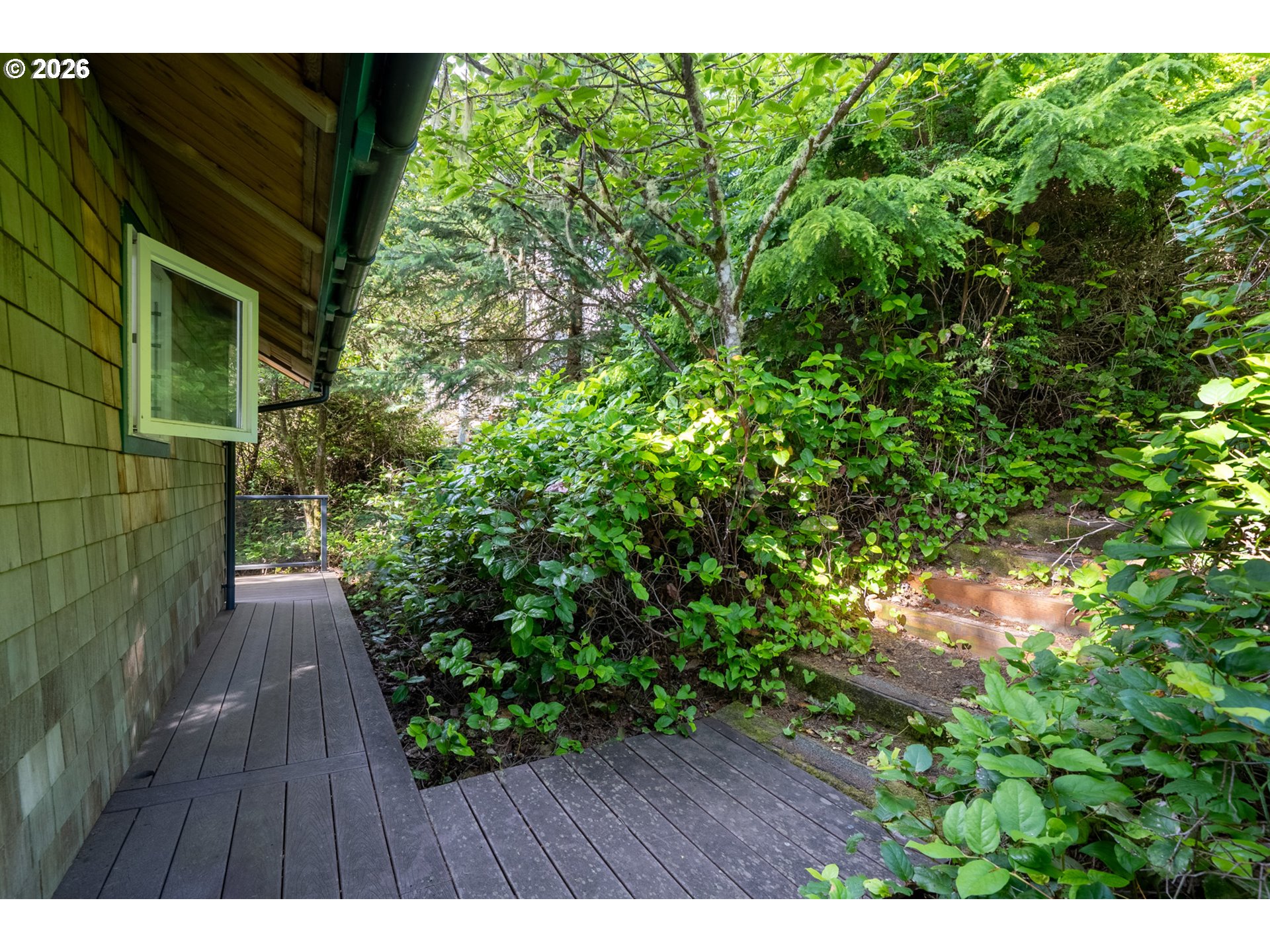 1560 Pearl Street West Netarts, OR 97141 - Photo 21 of 44 a view of backyard with pathway