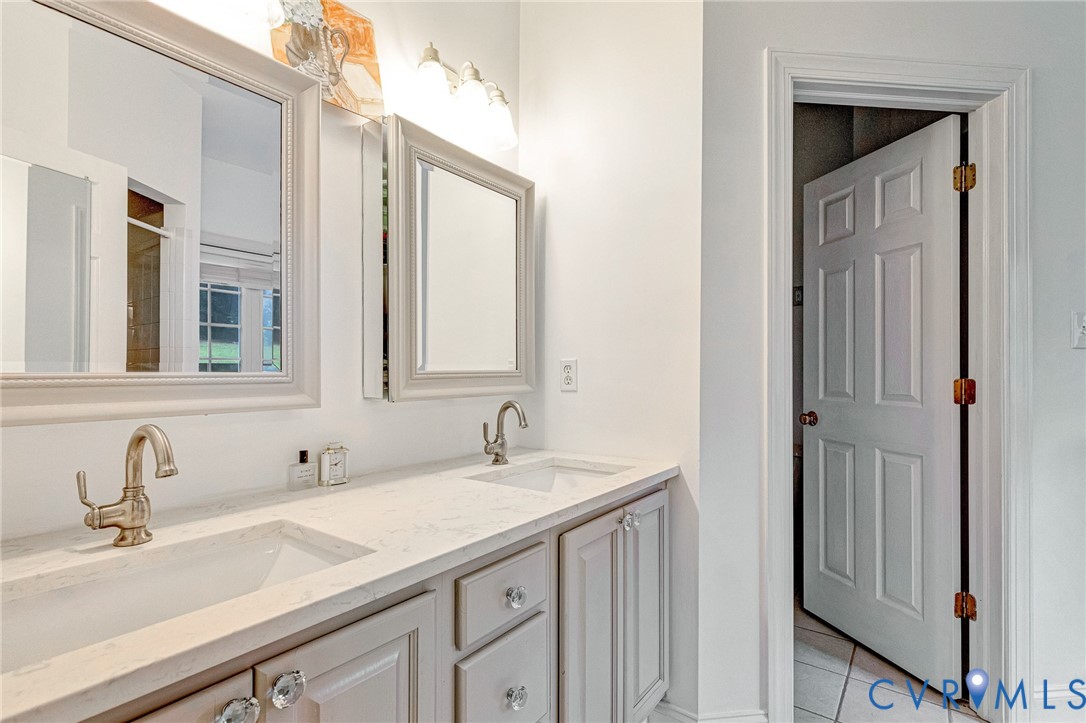 7708 Brookside Road Henrico, VA 23229 - Photo 29 of 50 Full bath with light tile patterned flooring, doub