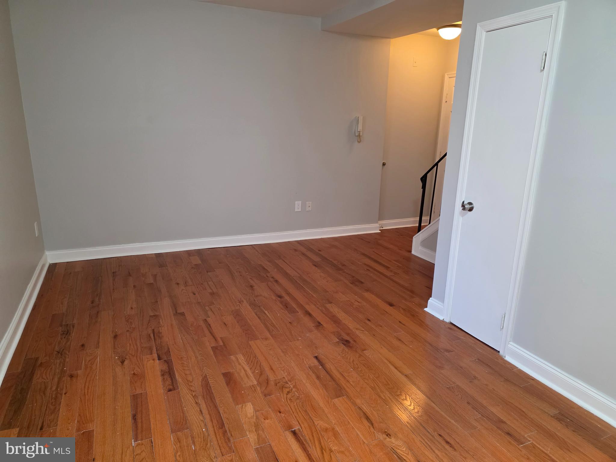 307 Arch Street, Unit 3B Philadelphia, PA 19106 - Photo 4 of 9 a view of wooden floor in an empty room