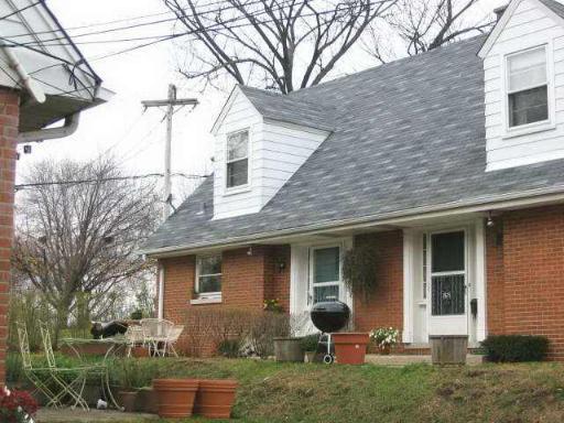 2677 Gross Point Road, Unit 2677 Evanston, IL 60201 - Photo 1 of 1 a view of a house with yard and chairs