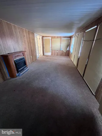 a view of a livingroom with furniture