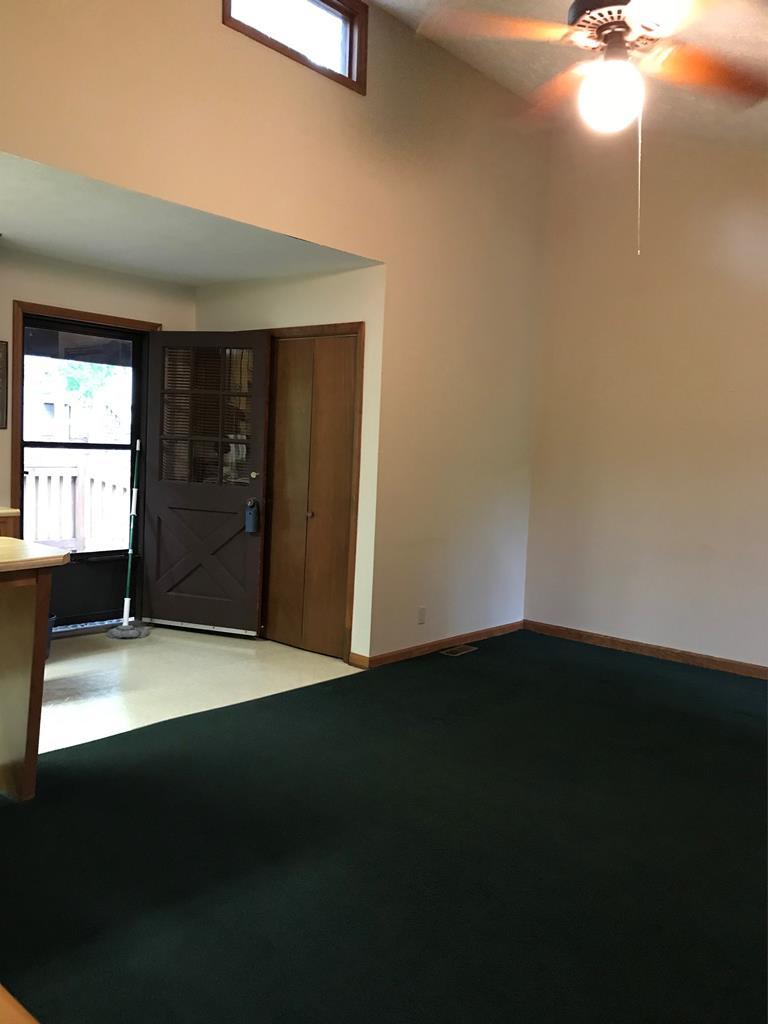 339 Bluegill Road Eatonton, GA 31024 - Photo 14 of 20 a view of an empty room with window and wooden floor